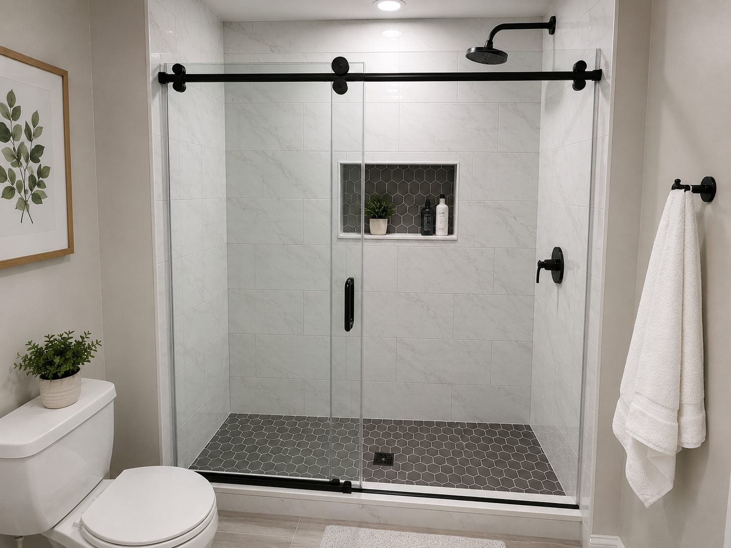 After: modern frameless glass shower with marble tile
